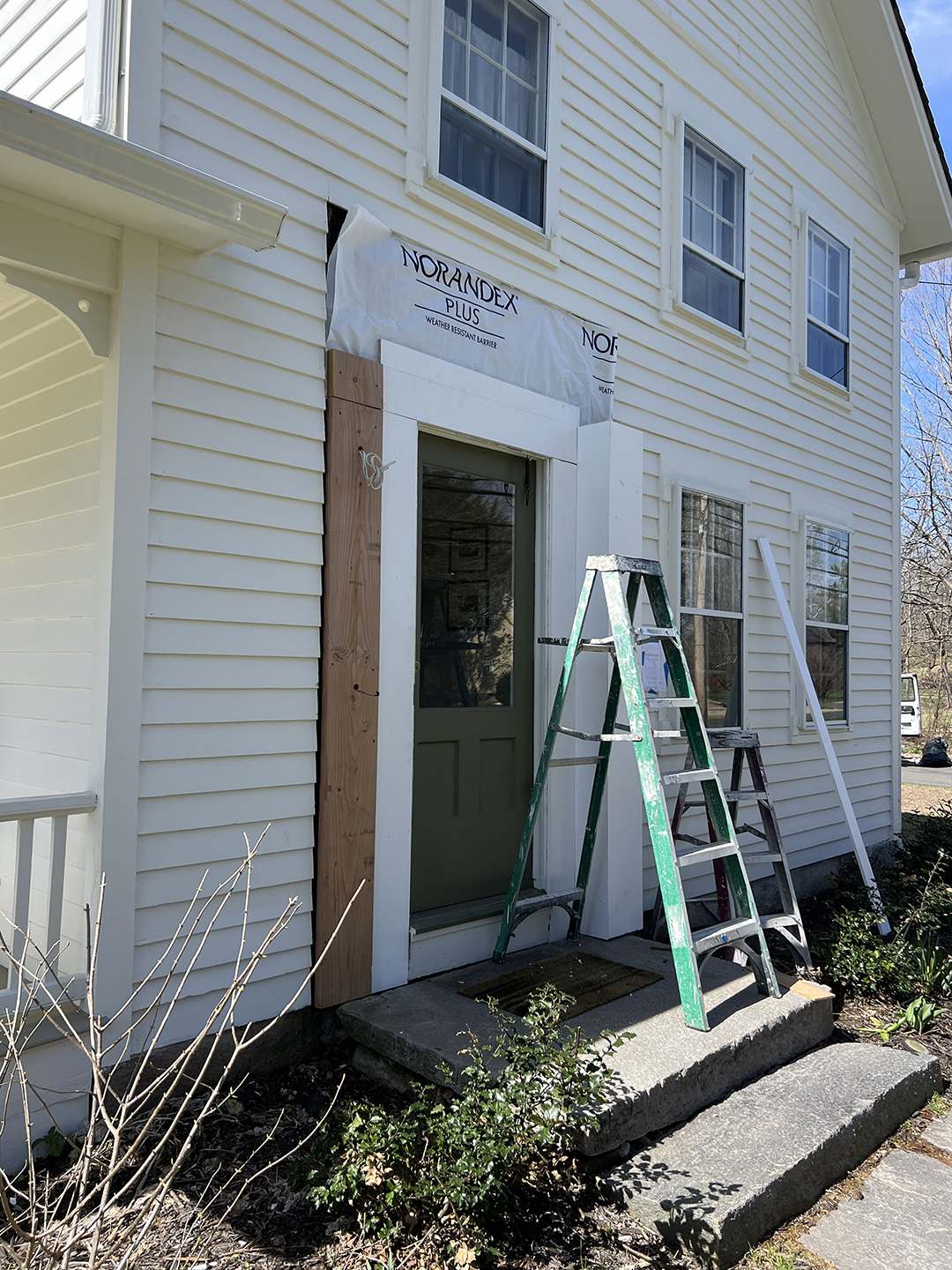 historic home exterior front door during construction