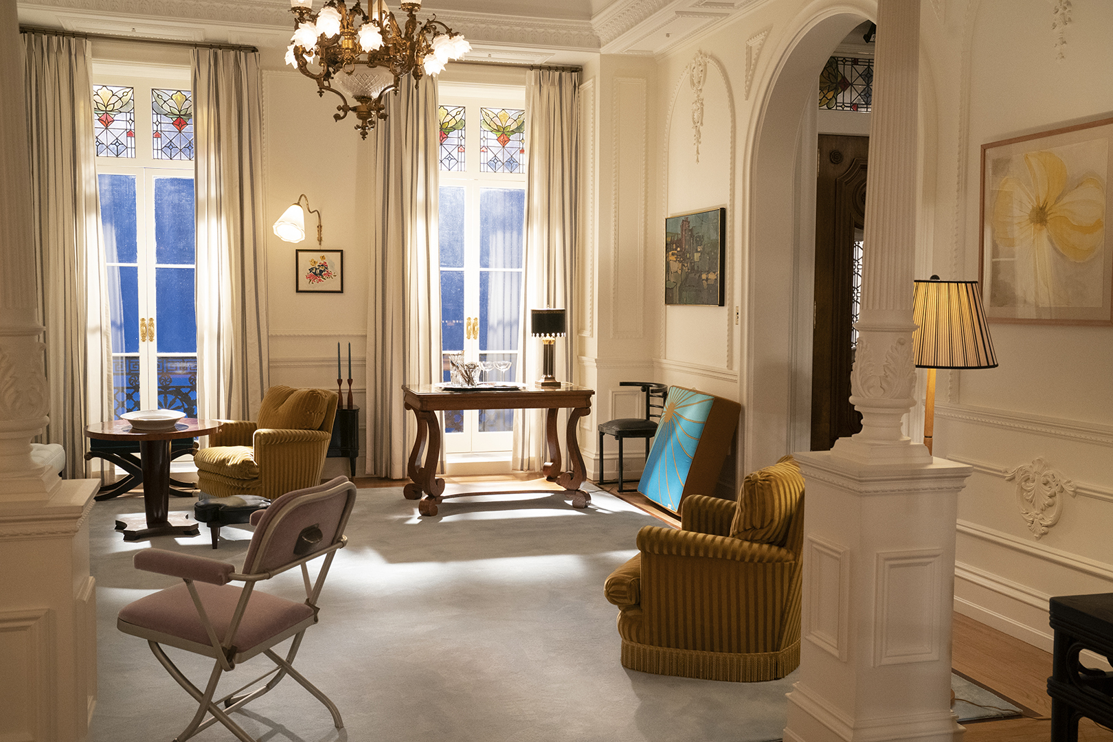 Two mustard accent chairs across the room from each other
