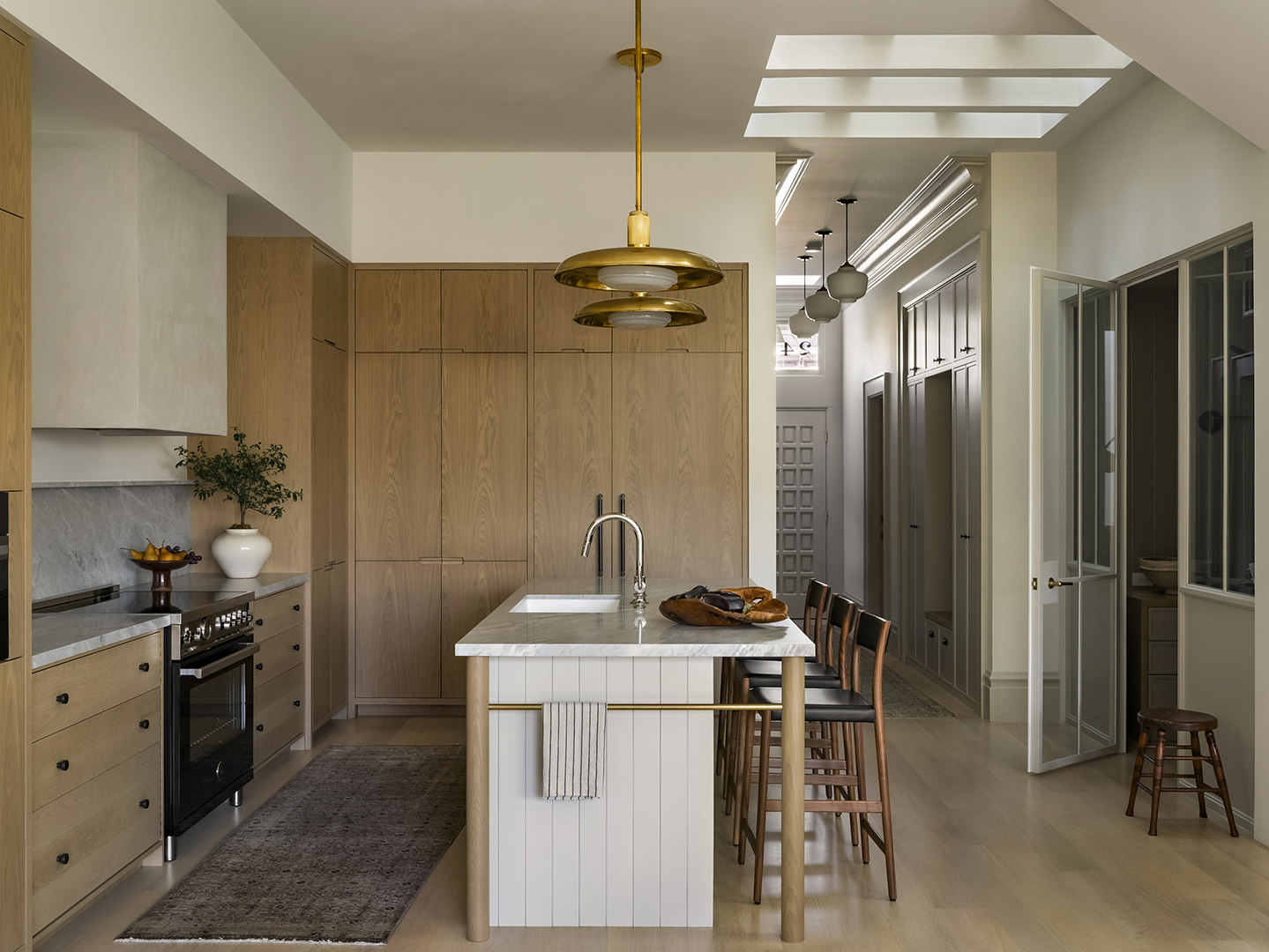 wood kitchen with skylights in ceiling