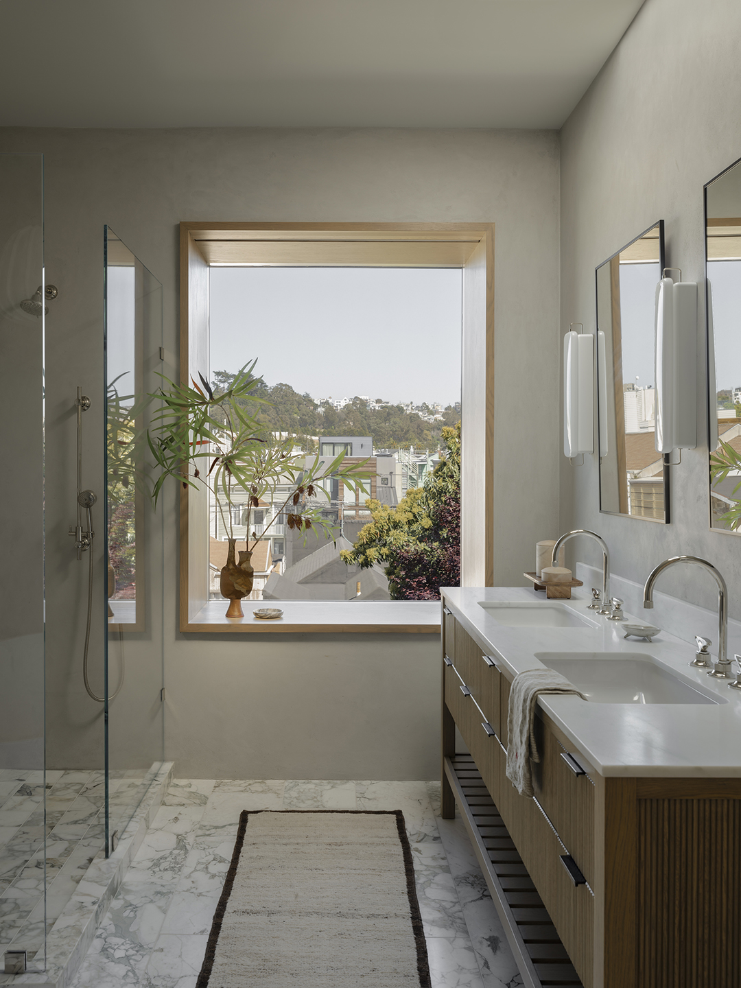 bathroom window lined in wood