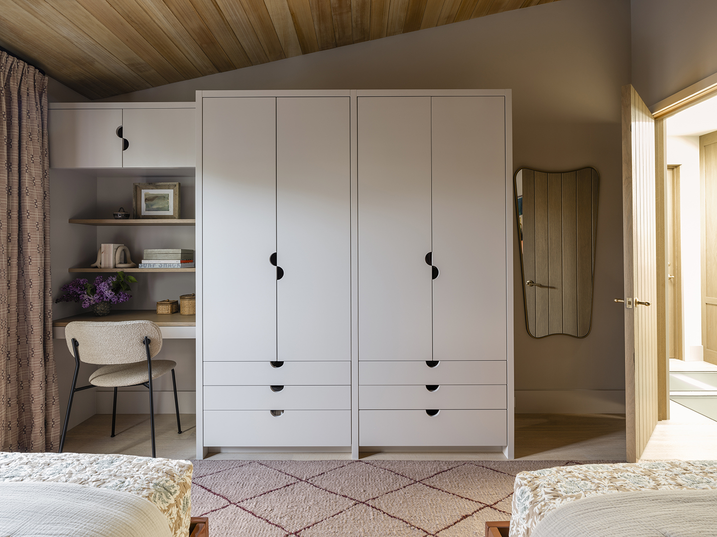 kids closet with built-in desk