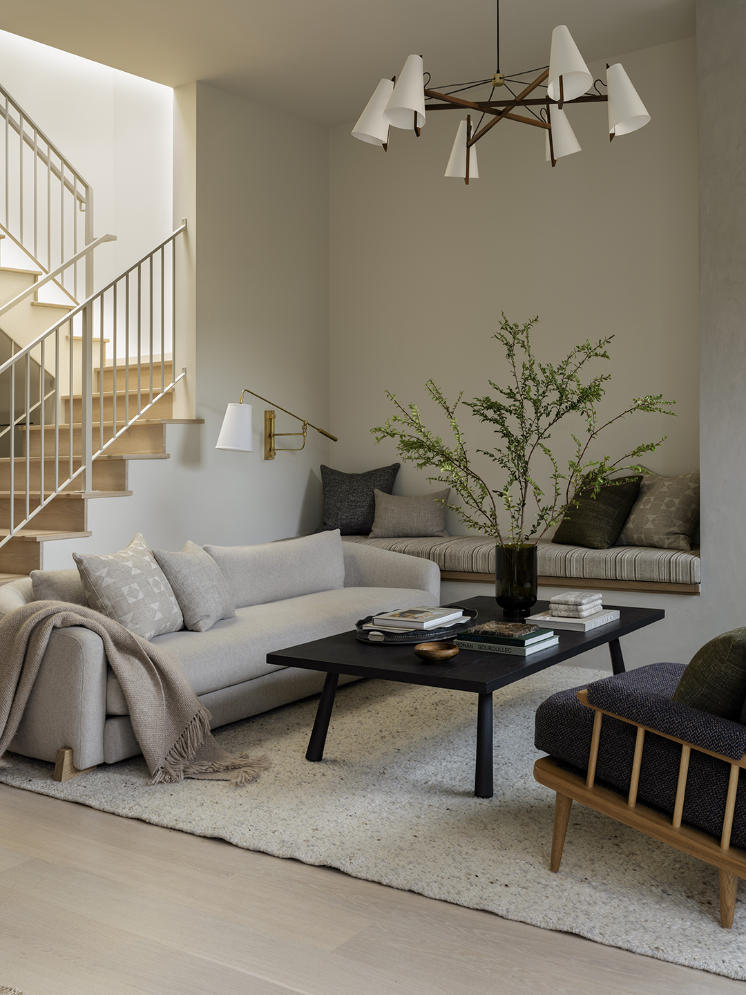 sofa near bottom of stairs