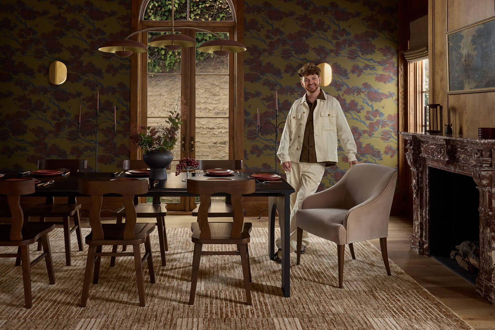 man leaning on chair