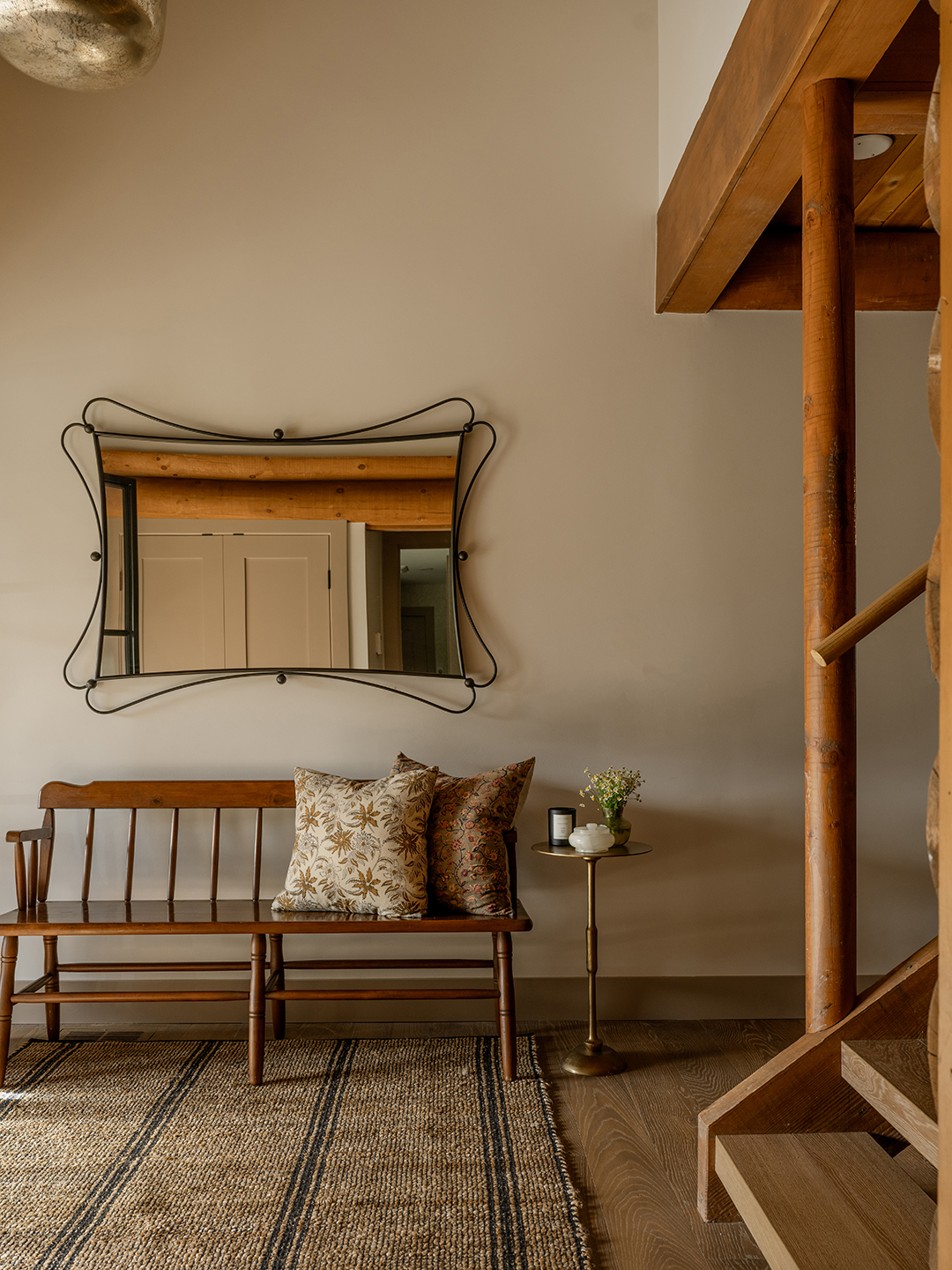 Mirror and bench in an entry