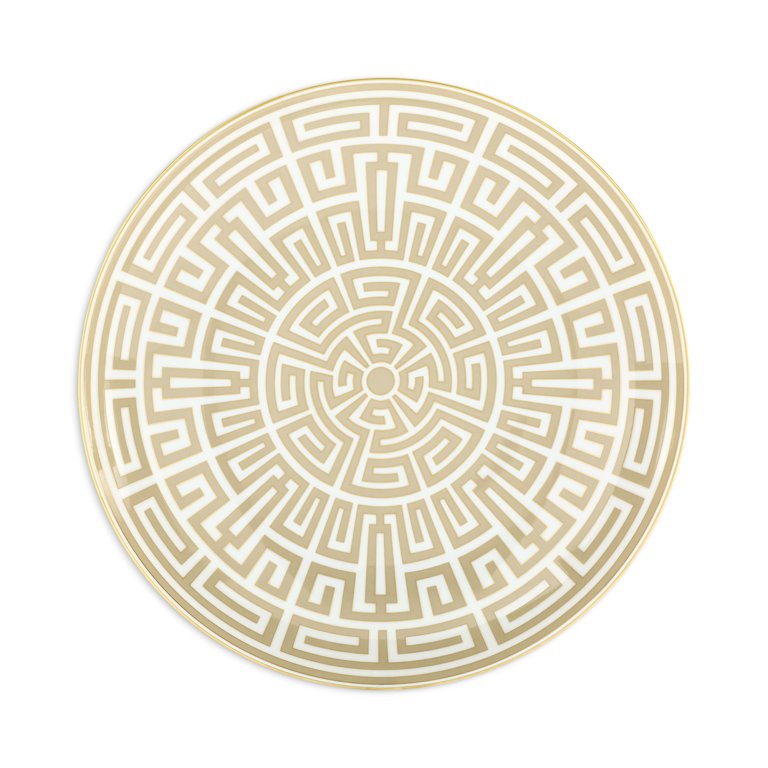 Plate with intricate labyrinth pattern in gold.