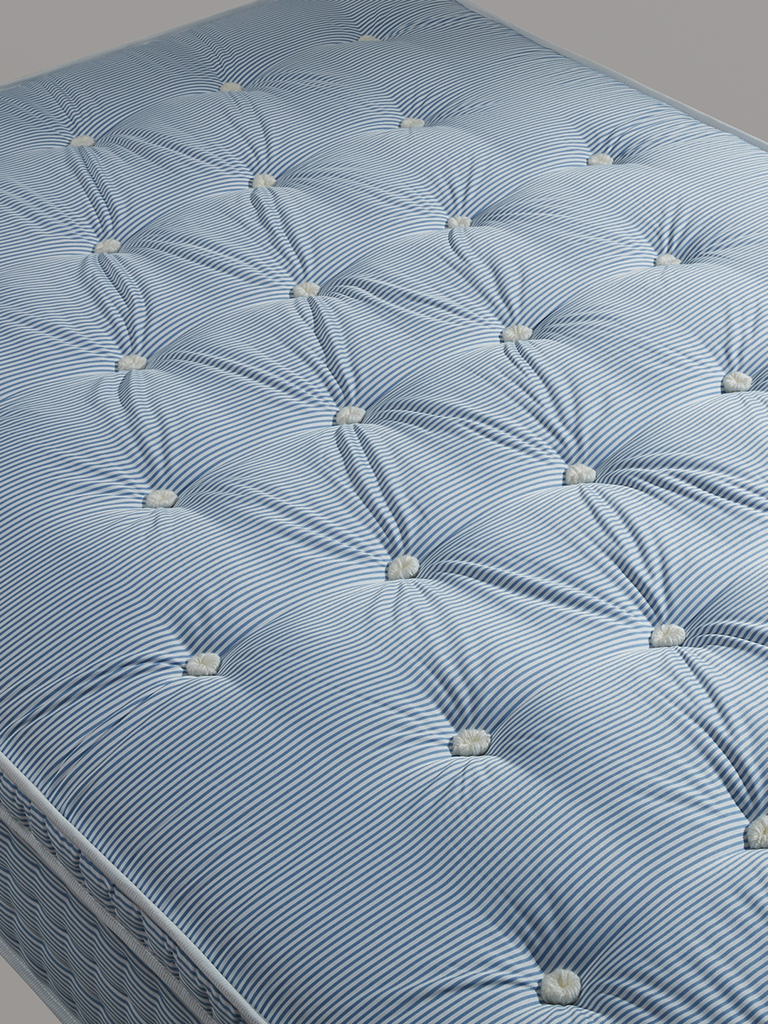 tufted blue mattress