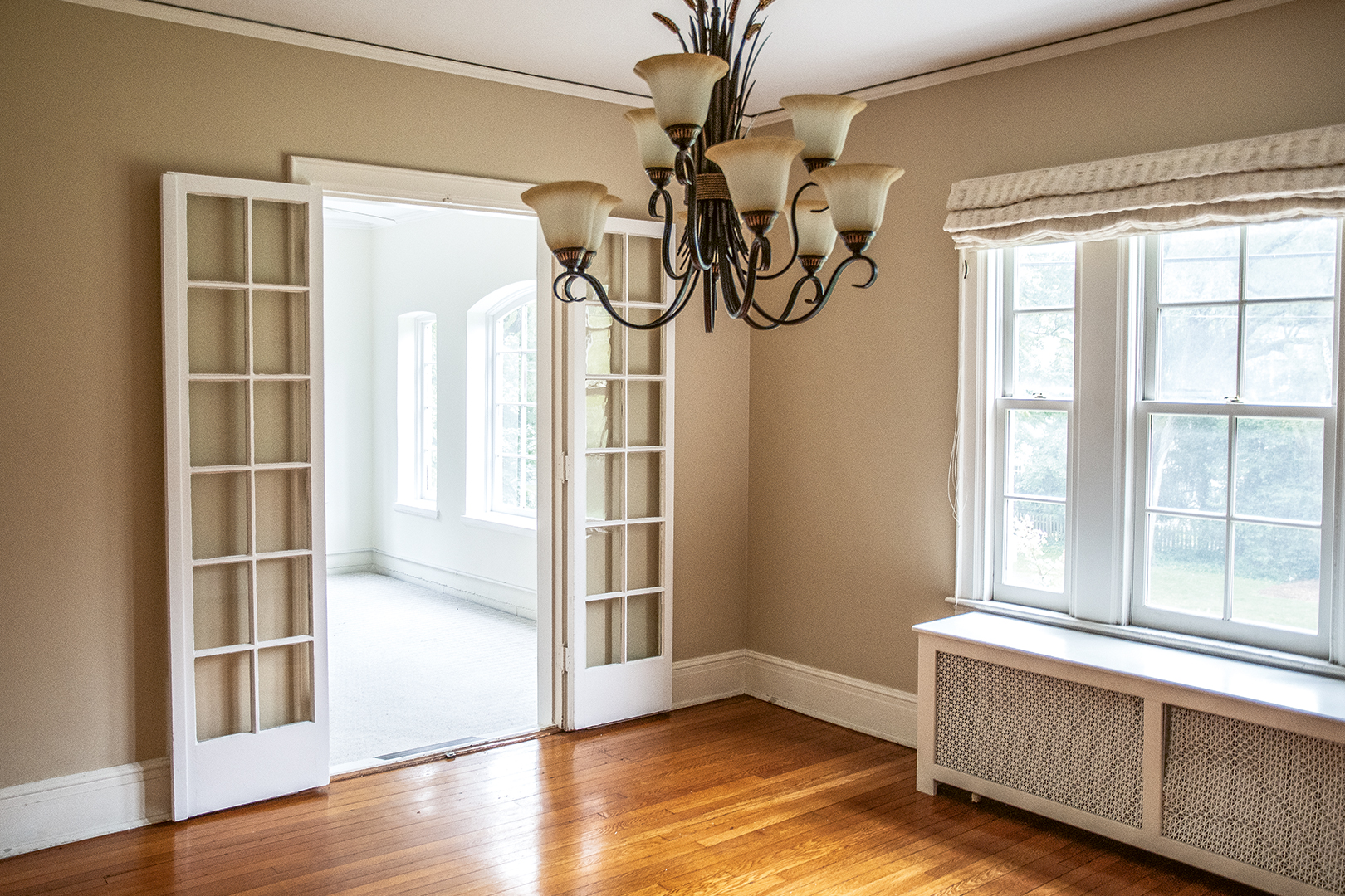Empty dining room with beige walls
