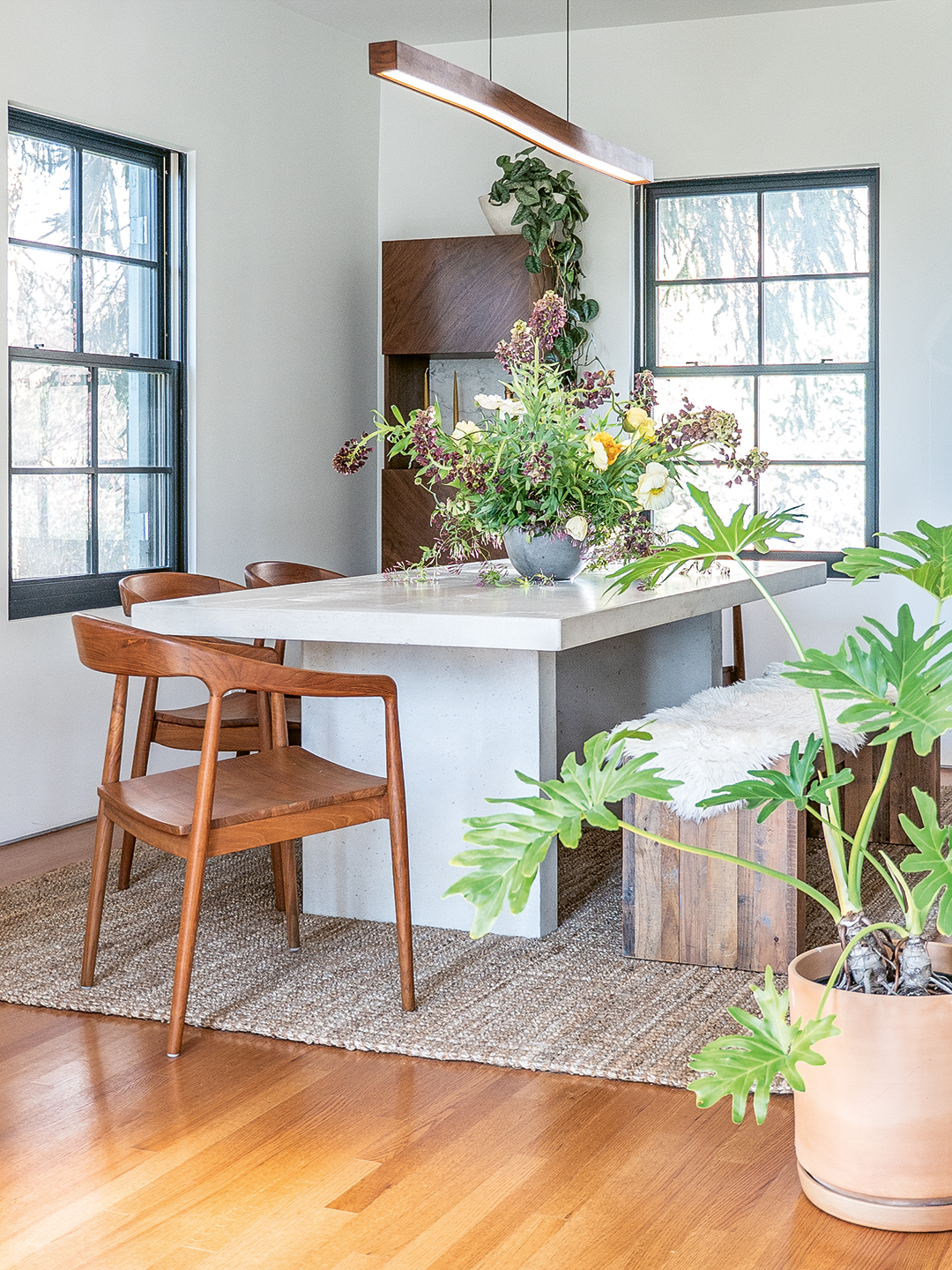 Stone table and white walls in dining room