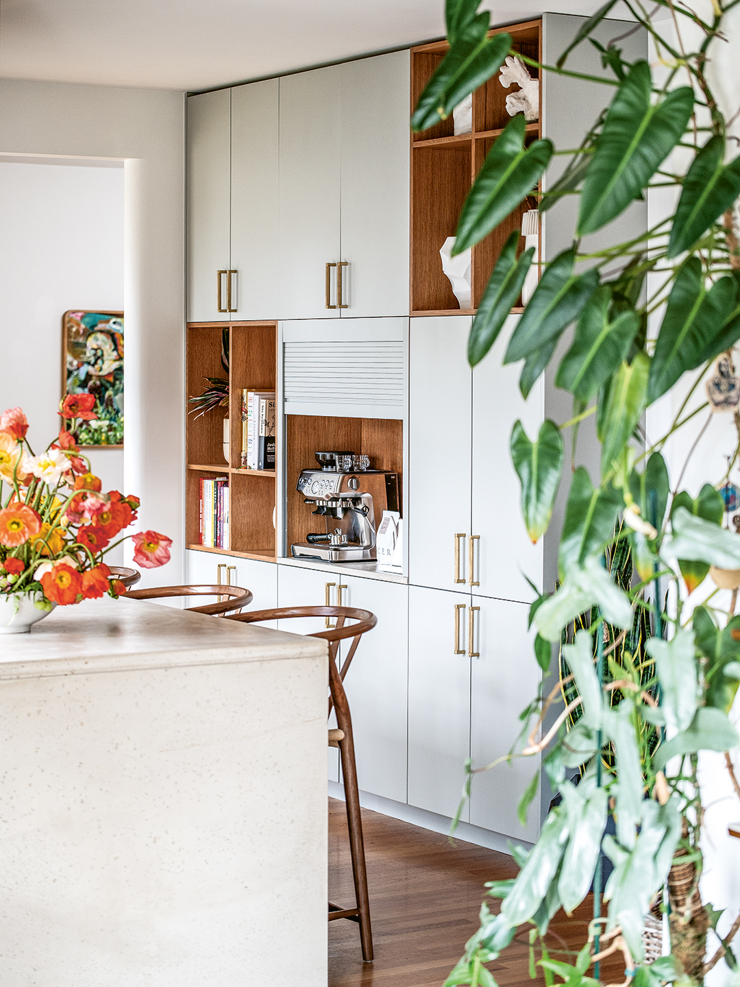 Kitchen island and wall of cabinetry