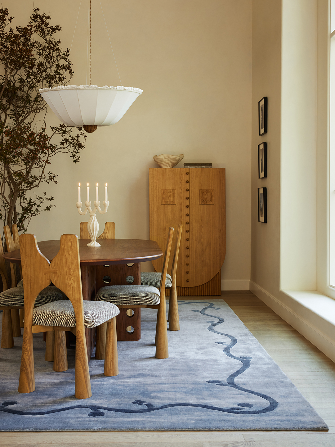 dining room with blue rug