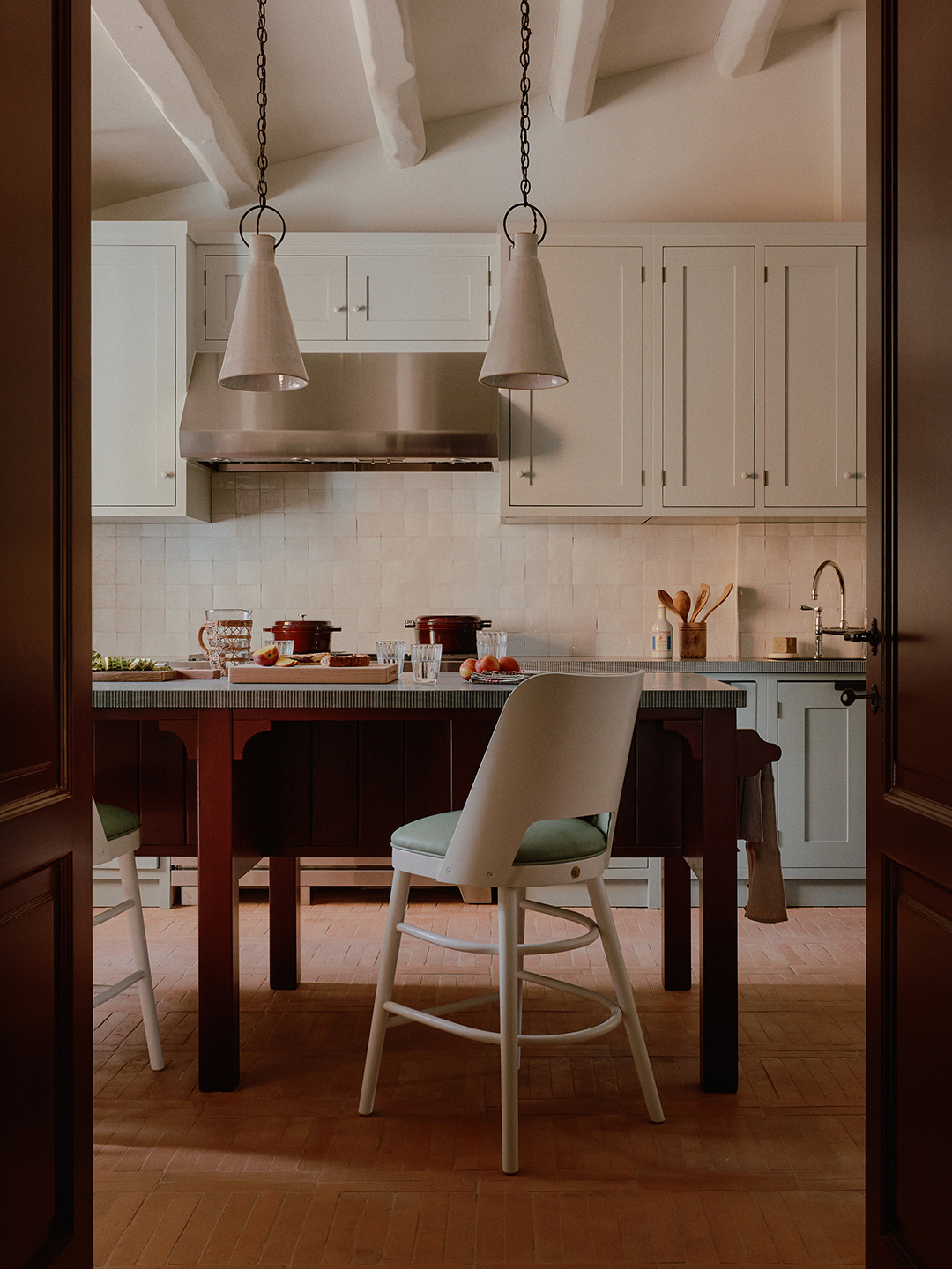Kitchen with zelliege tile and central island