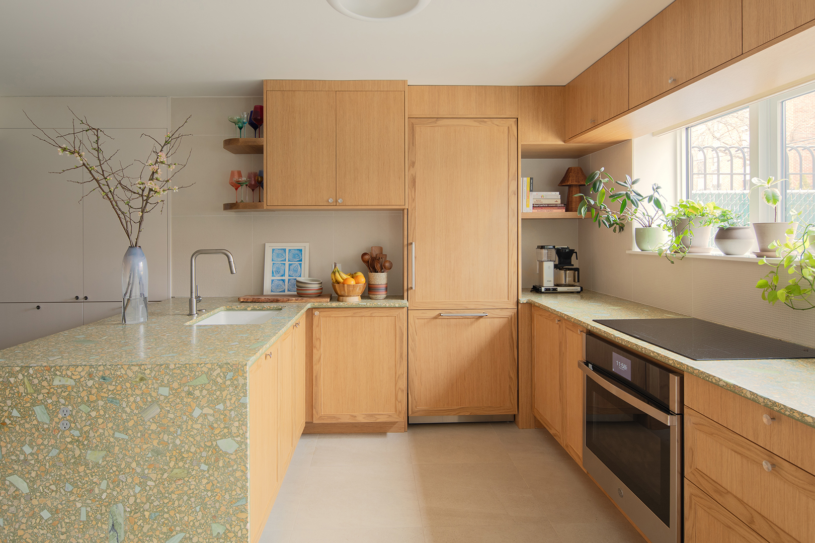 wood cabinets and green counter