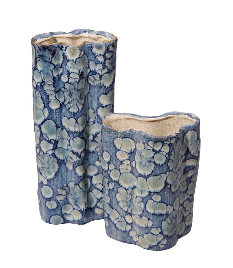  Two ceramic vases with blue reactive glaze patterning.