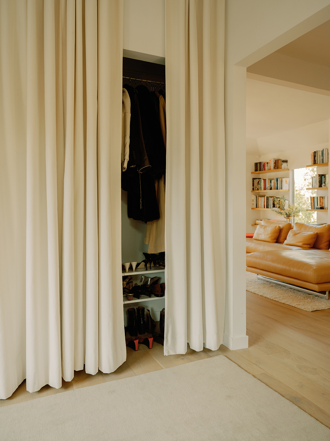 white curtains covering closet