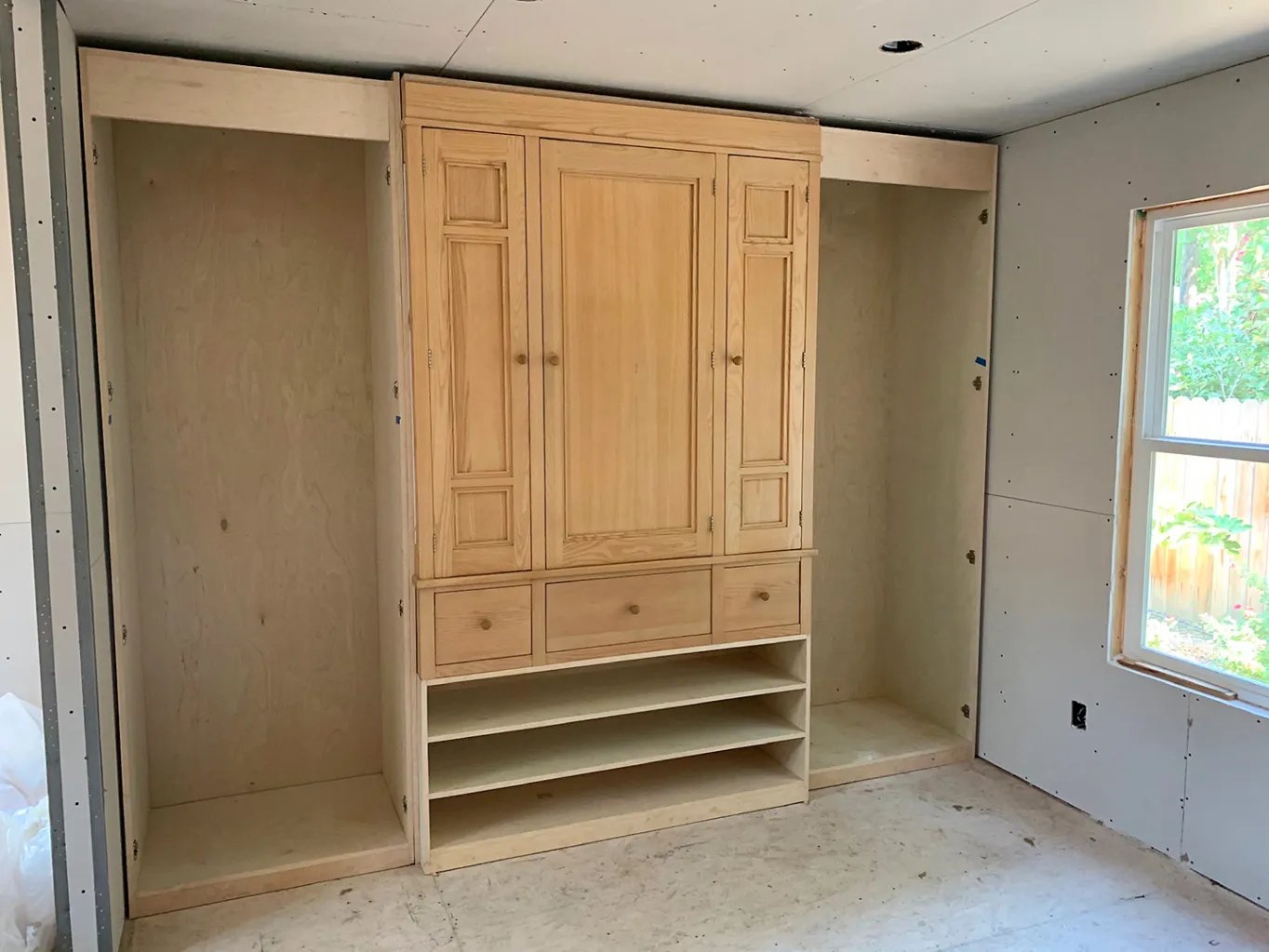 wood armoire in wall