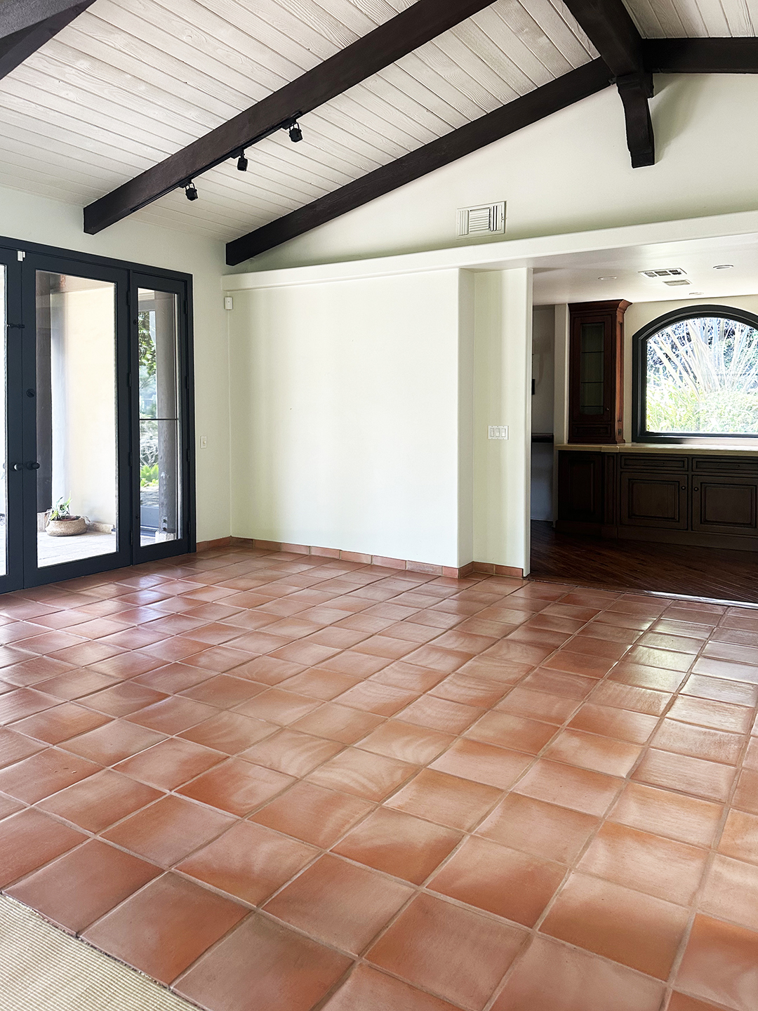 empty room with terracotta floors