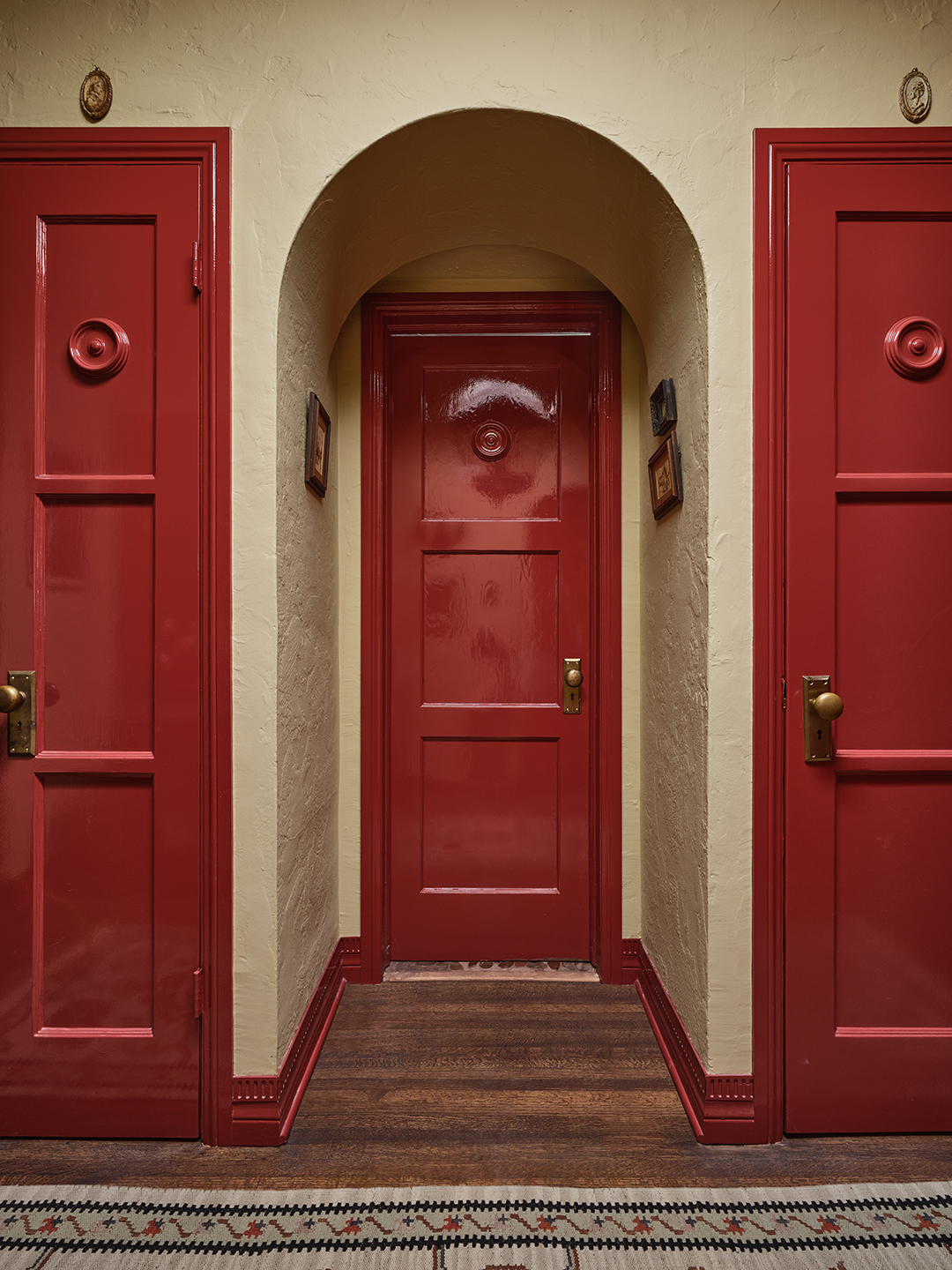 red hallway doors
