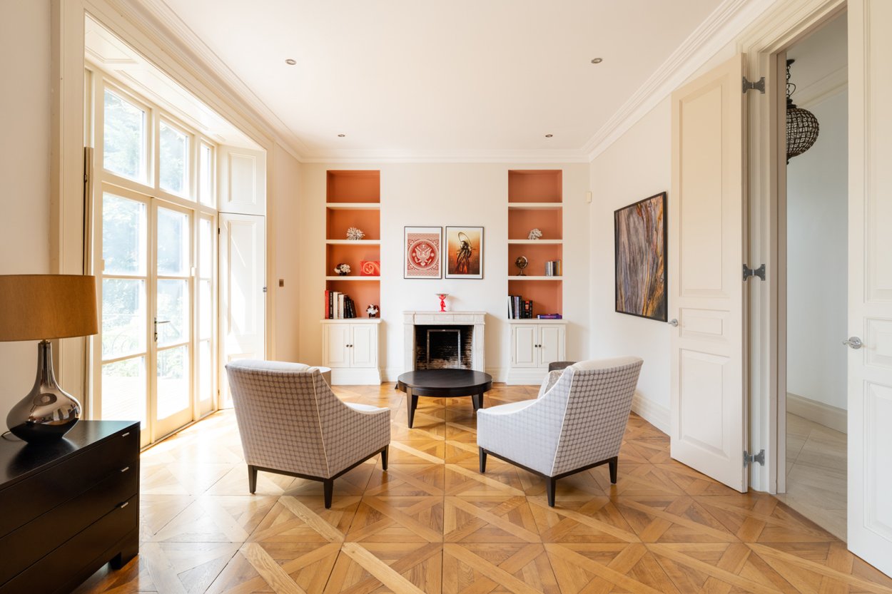 living room with parquet floors