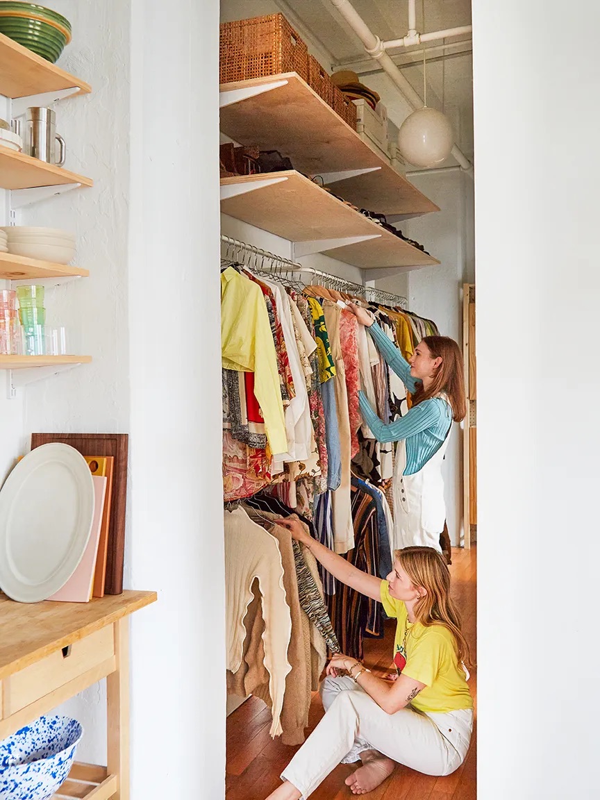 hallway with hanging racks