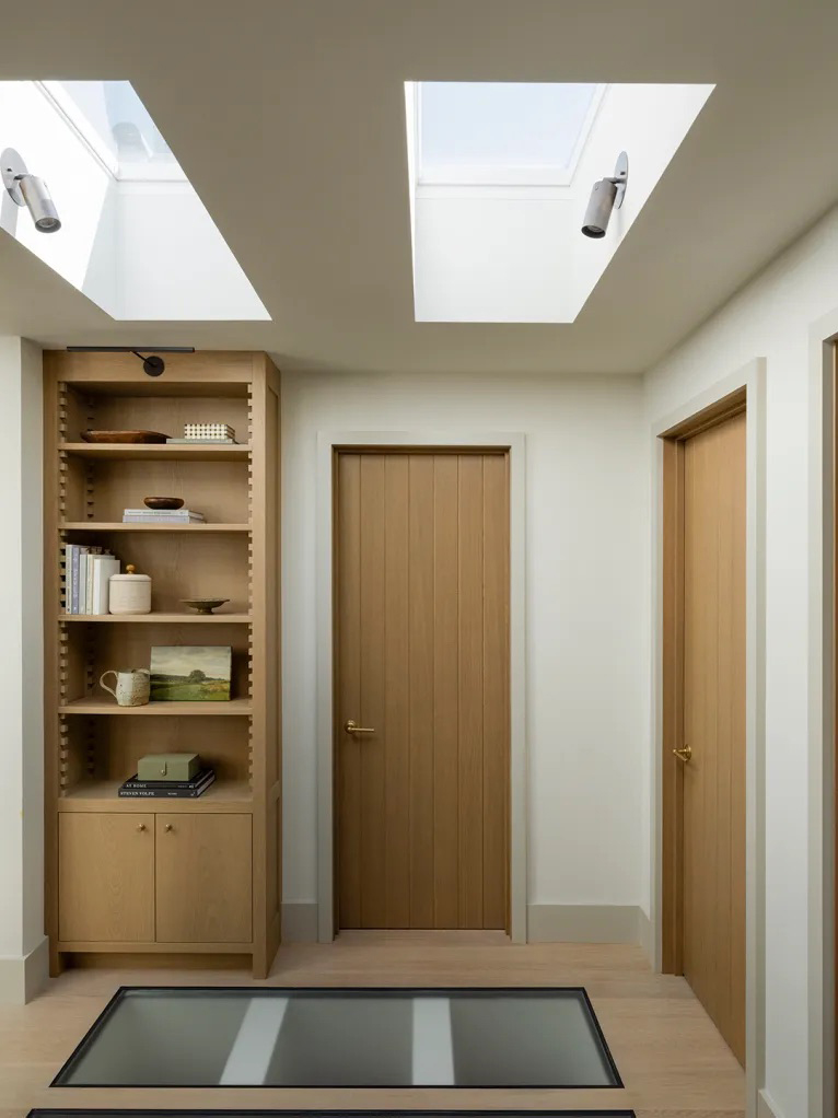 hallway with skylights