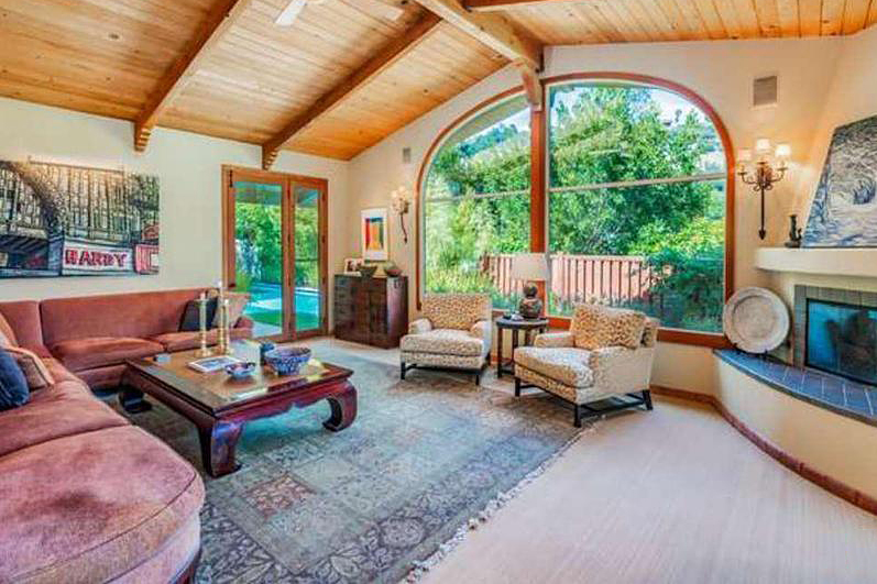 living room with arch window