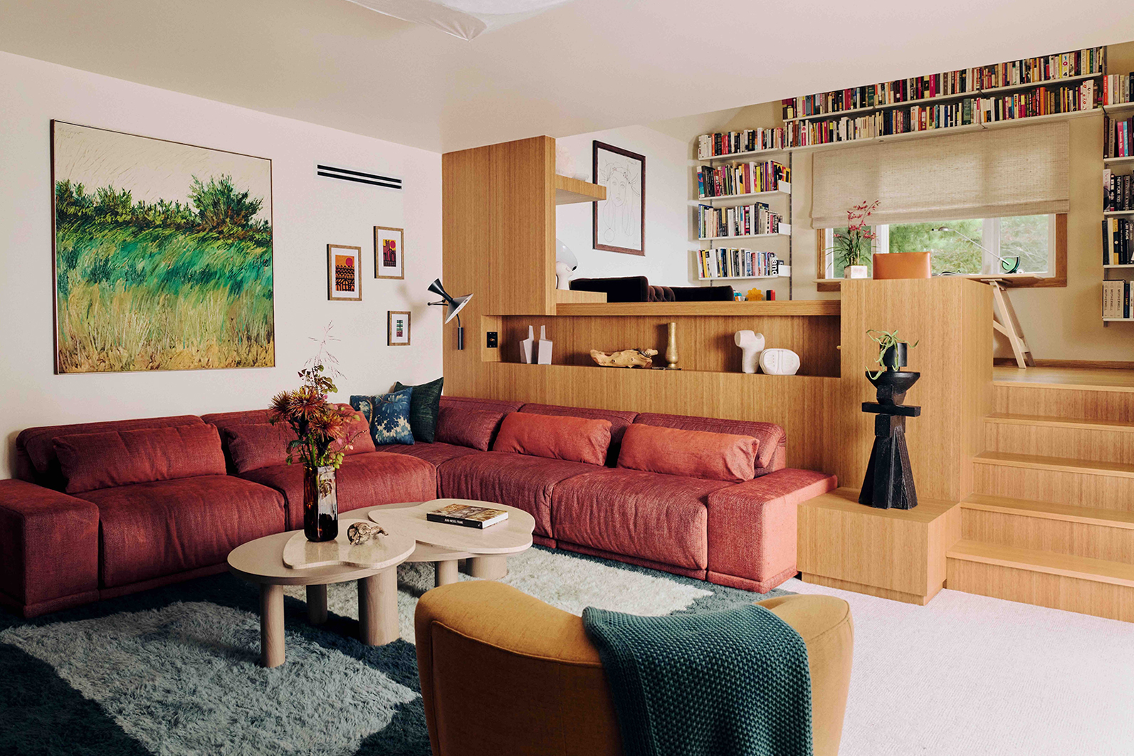 red sofa below partition