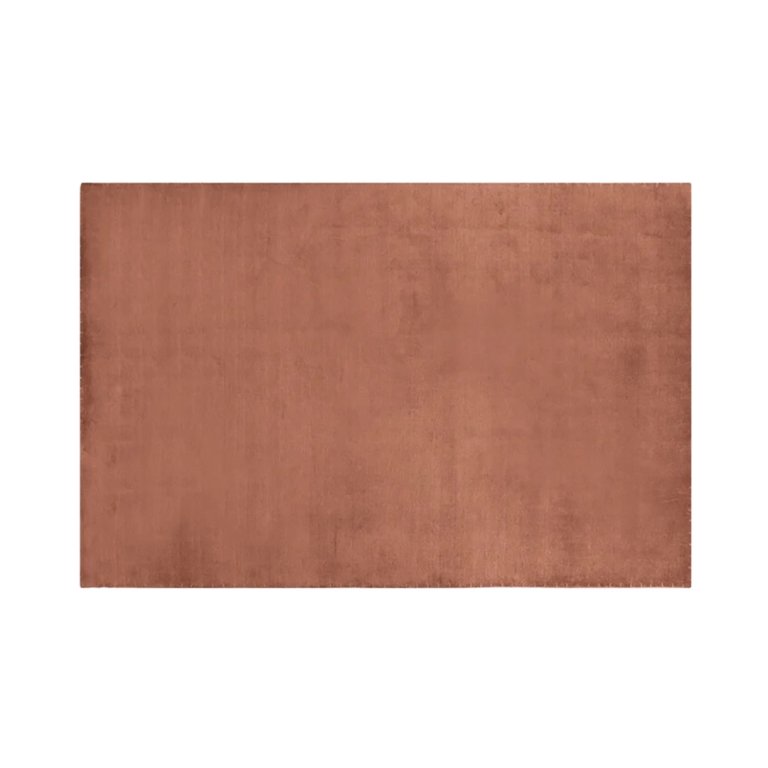  solid salmon-colored area rug