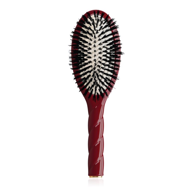  red hairbrush with twisted handle