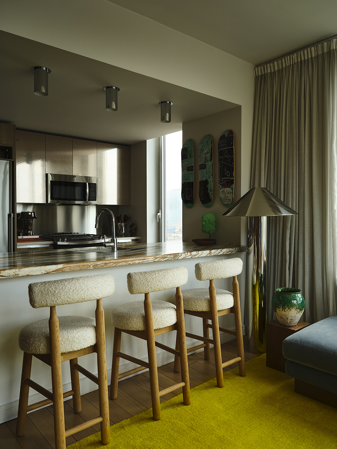 white boucle stools at counter