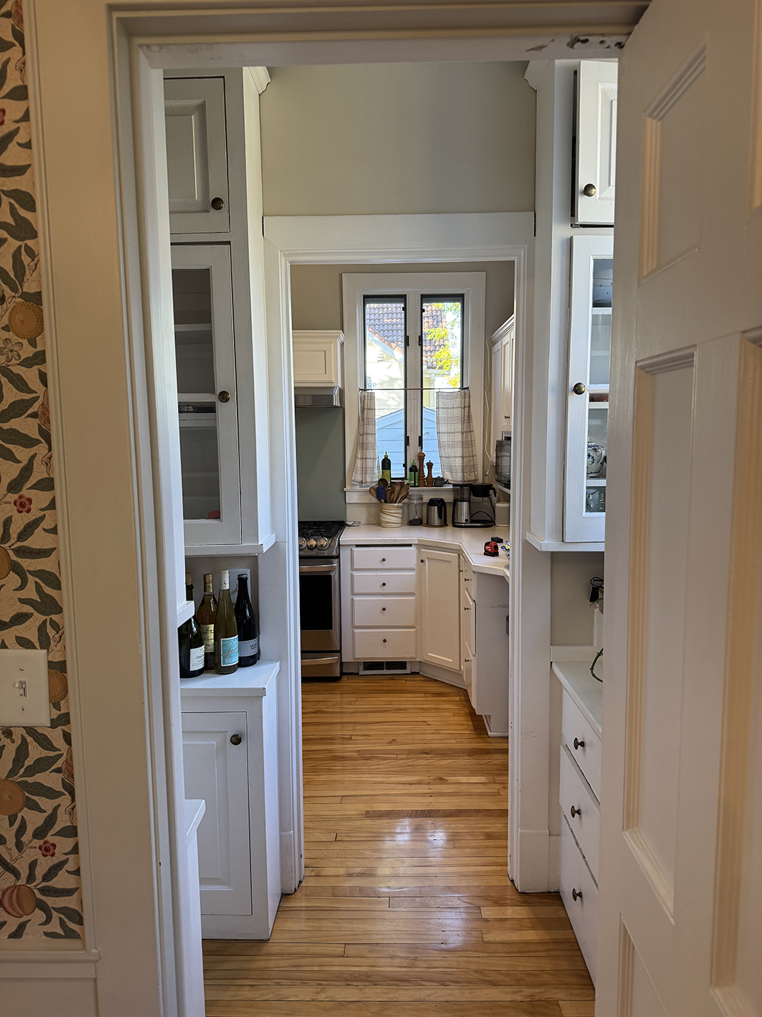narrow hallway from pantry to kitchen