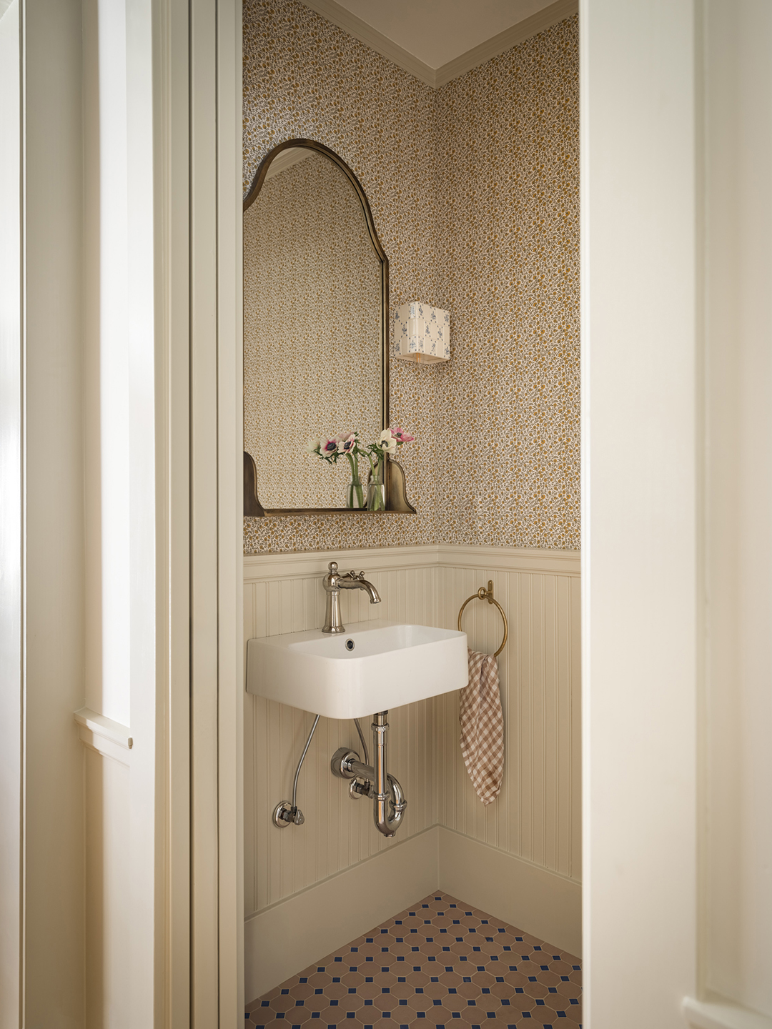 classic powder room with pocket door