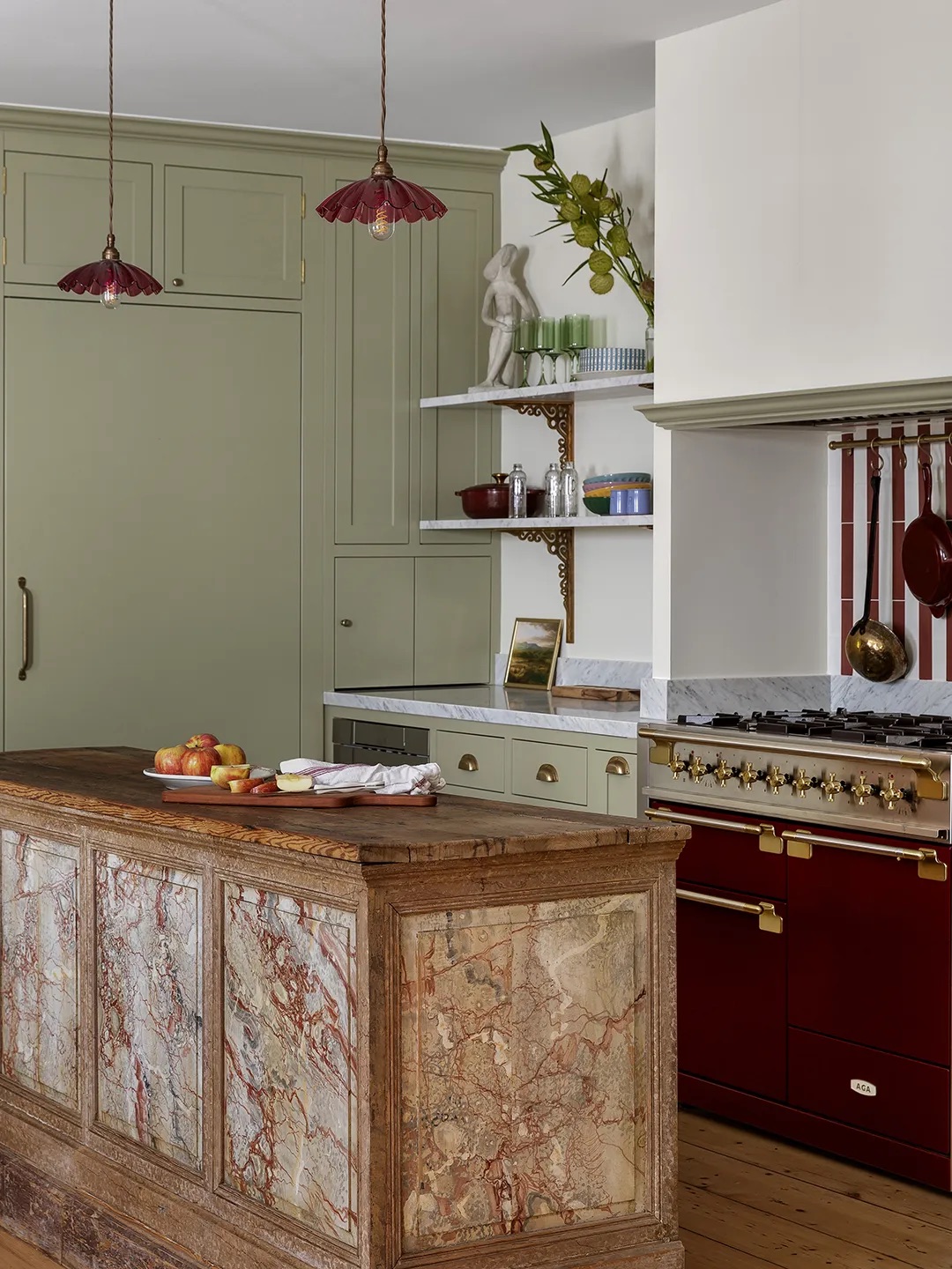 green ktichen with rustic island