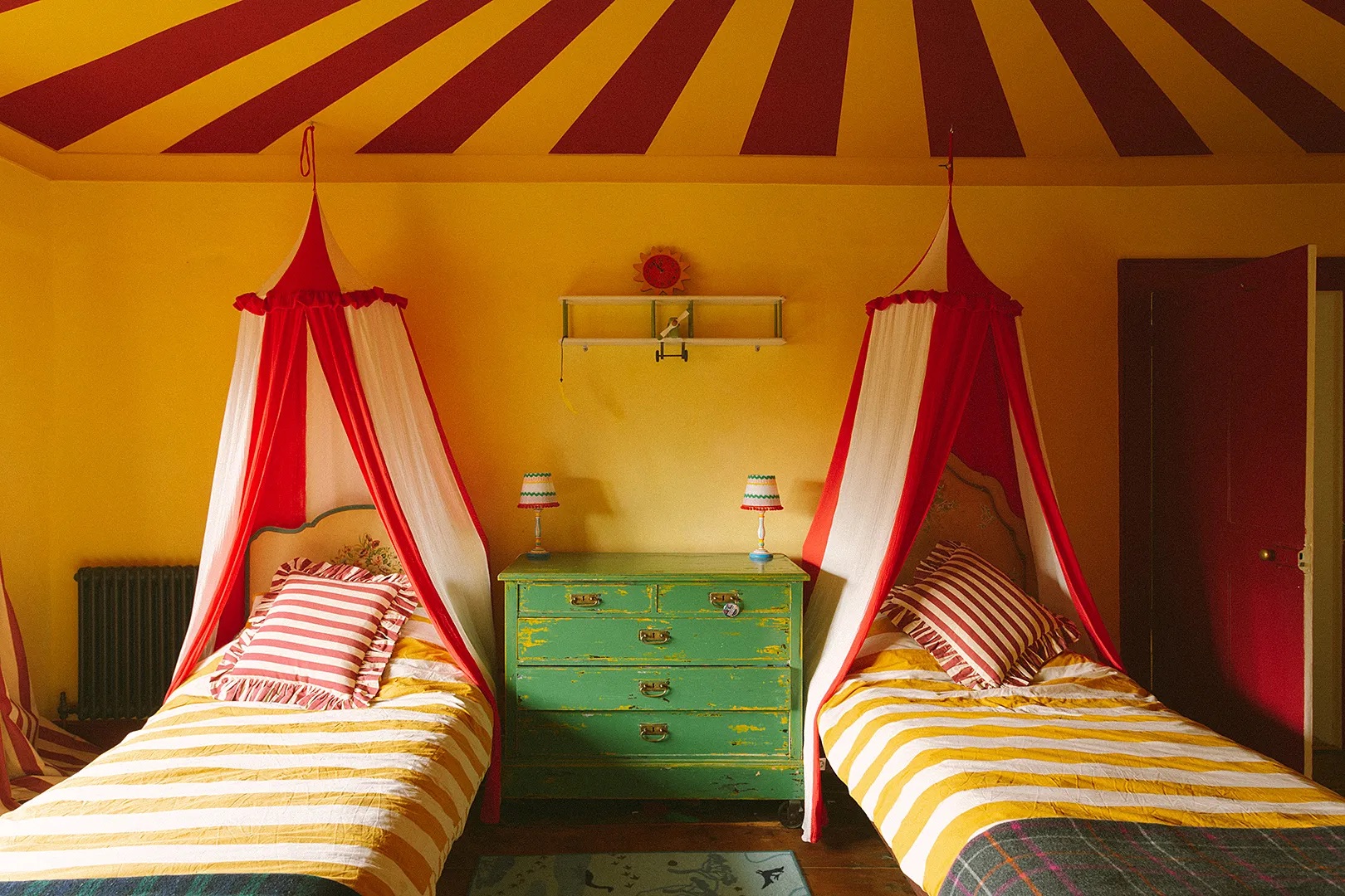 twin beds with mini canopies