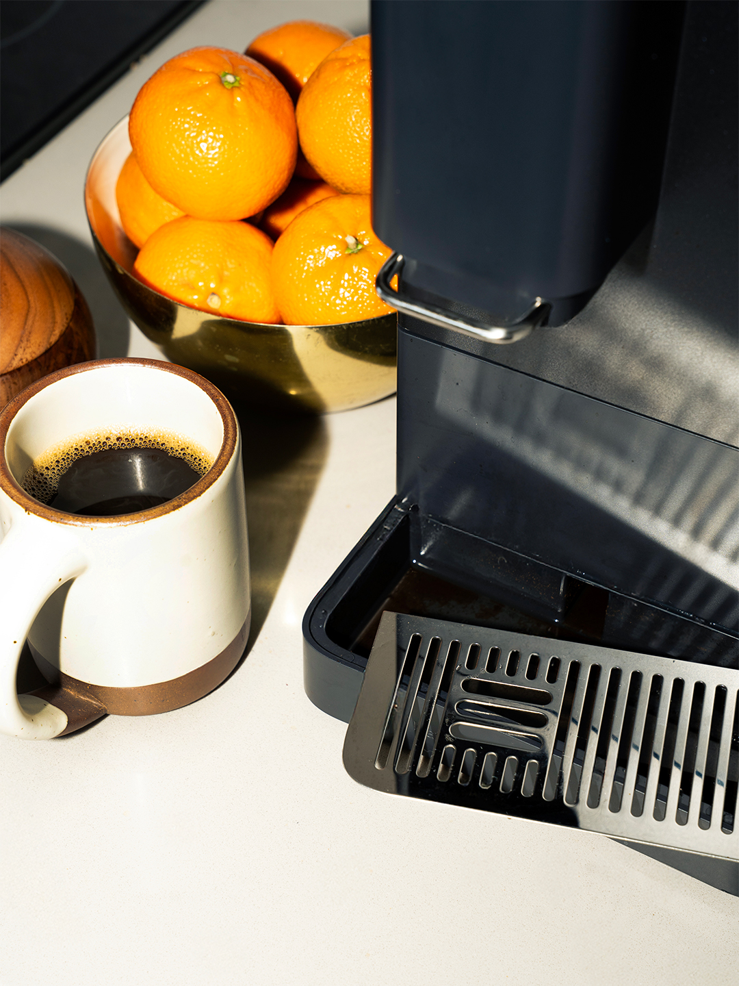 coffee mug next to drip tray