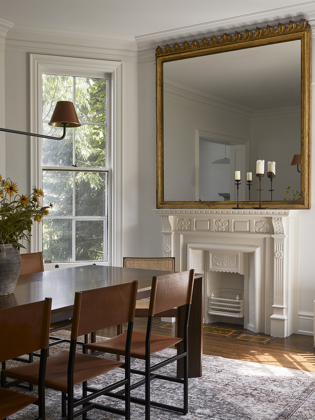 dining room with large mirror