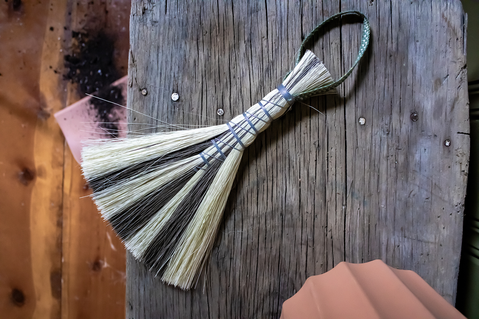 gray and white hand broom