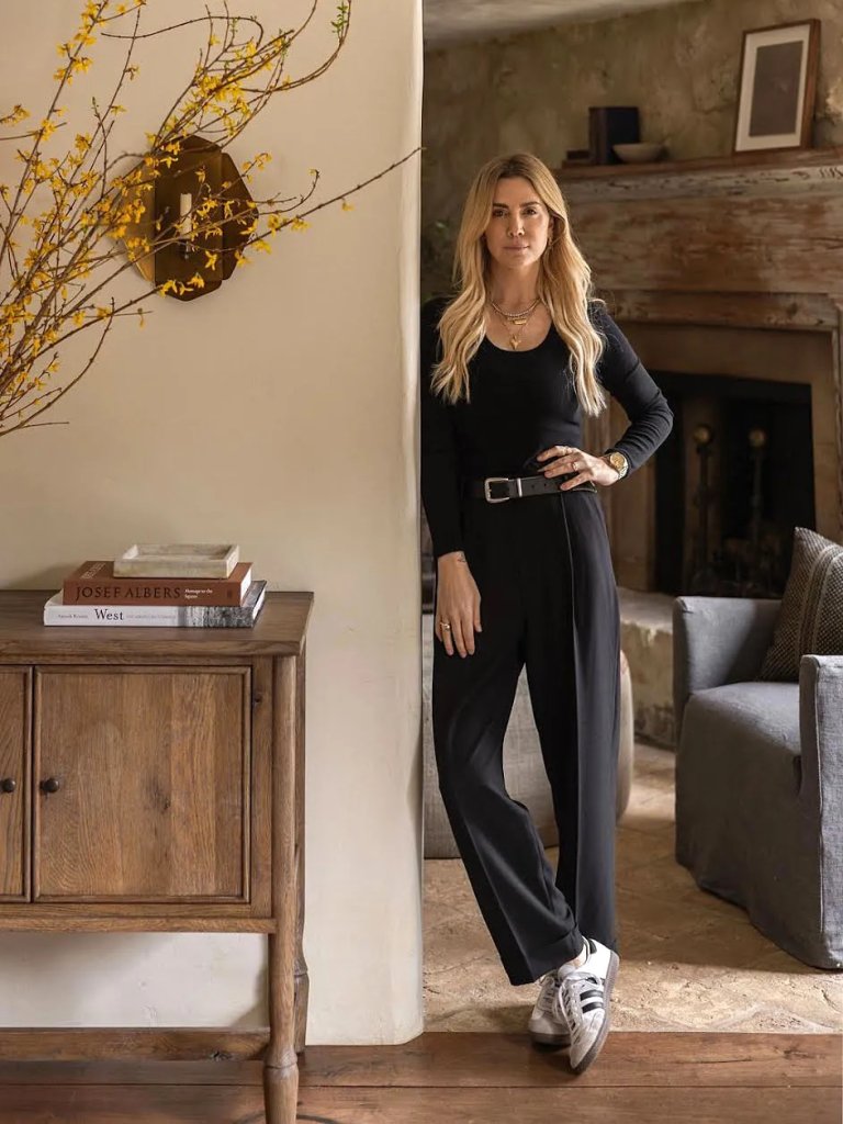 woman leaning on wall