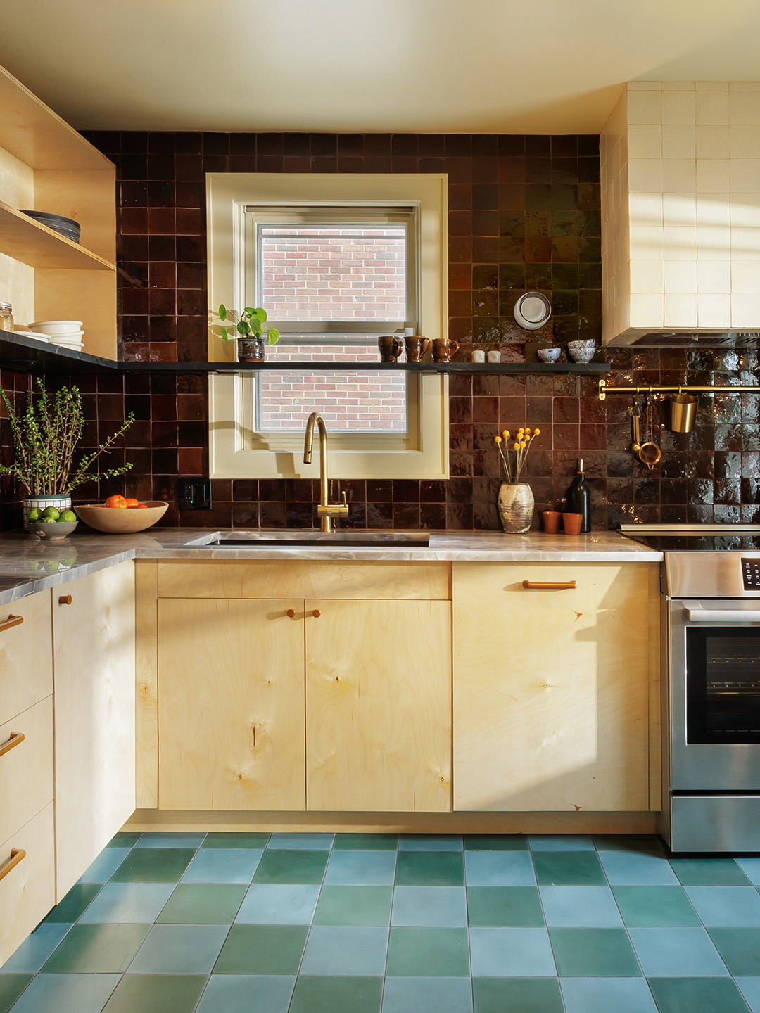 kitchen with wood cabinetry and blue tile floor