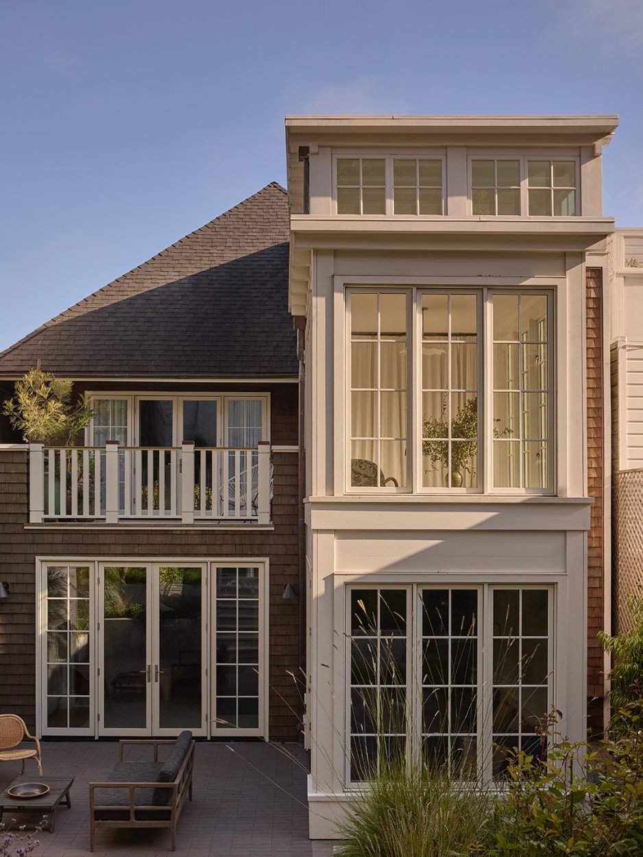 elevation of a two-story home with many windows