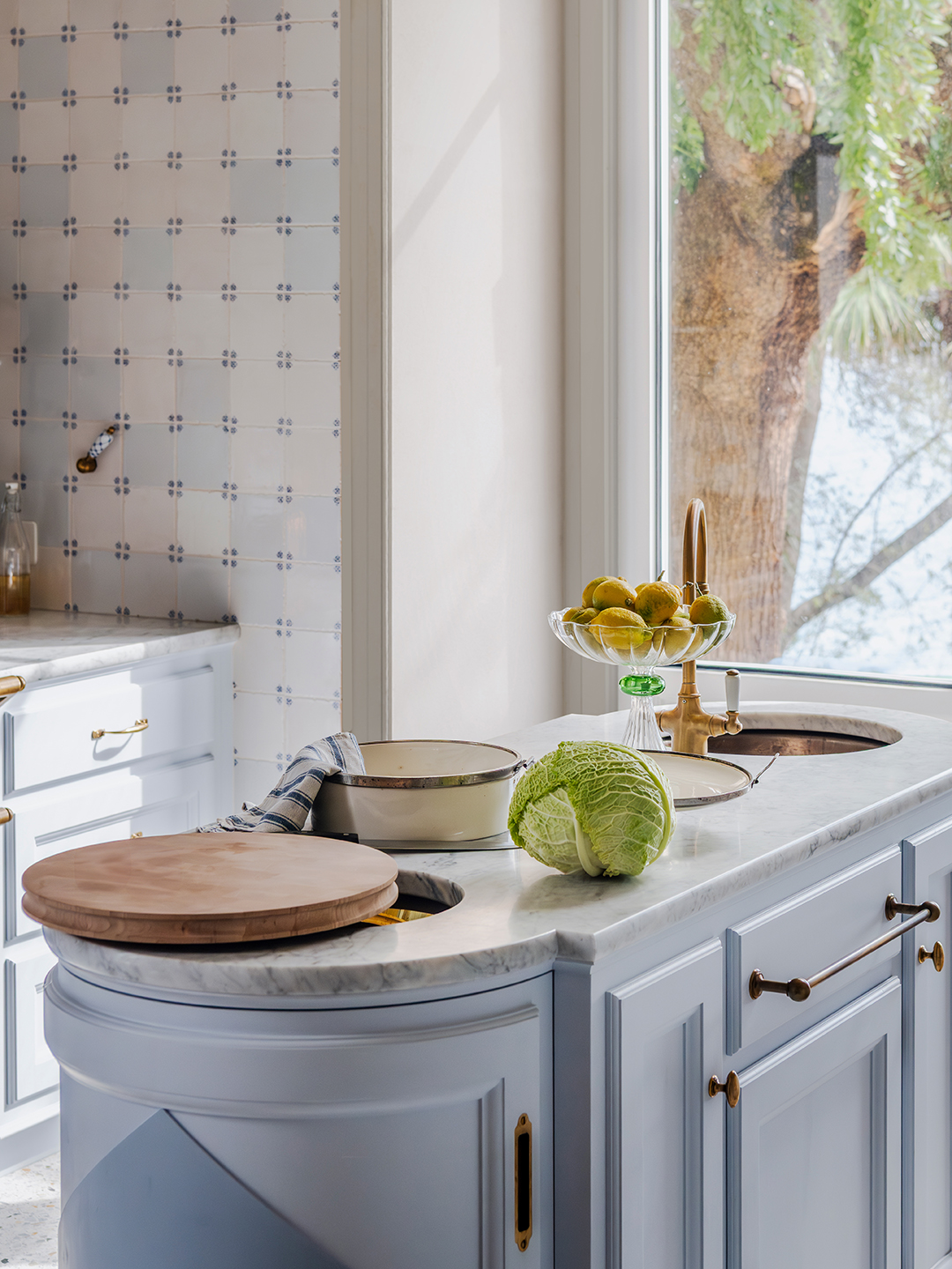 kitchen island with an opening under the cutting board