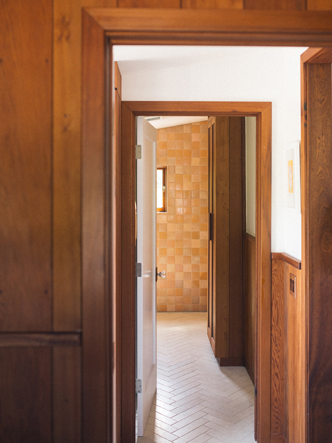 view into terracotta tiled shower