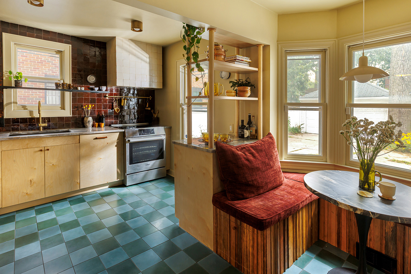 blonde wood kitchen with eat-in dining table