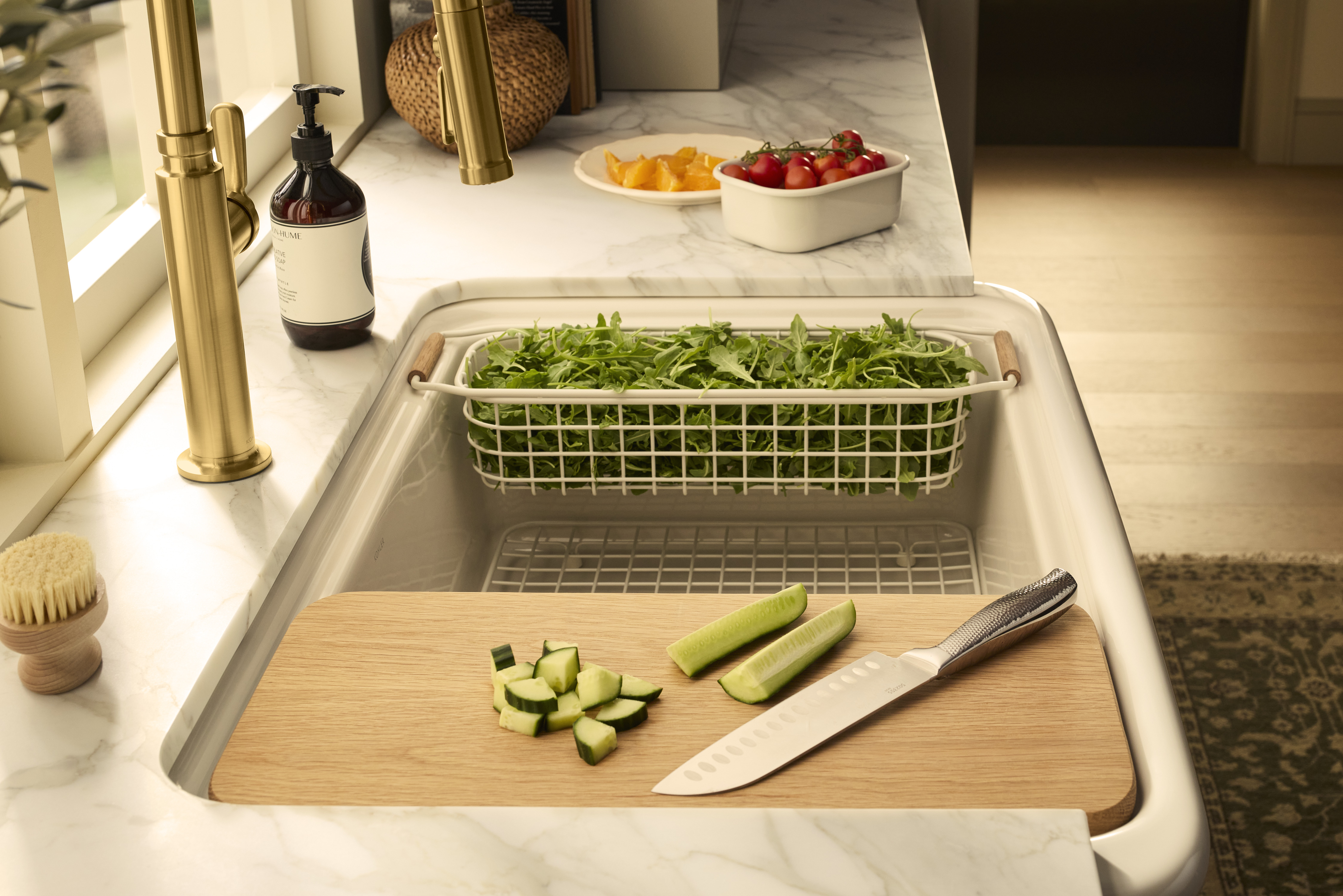 basket and cutting board in sink