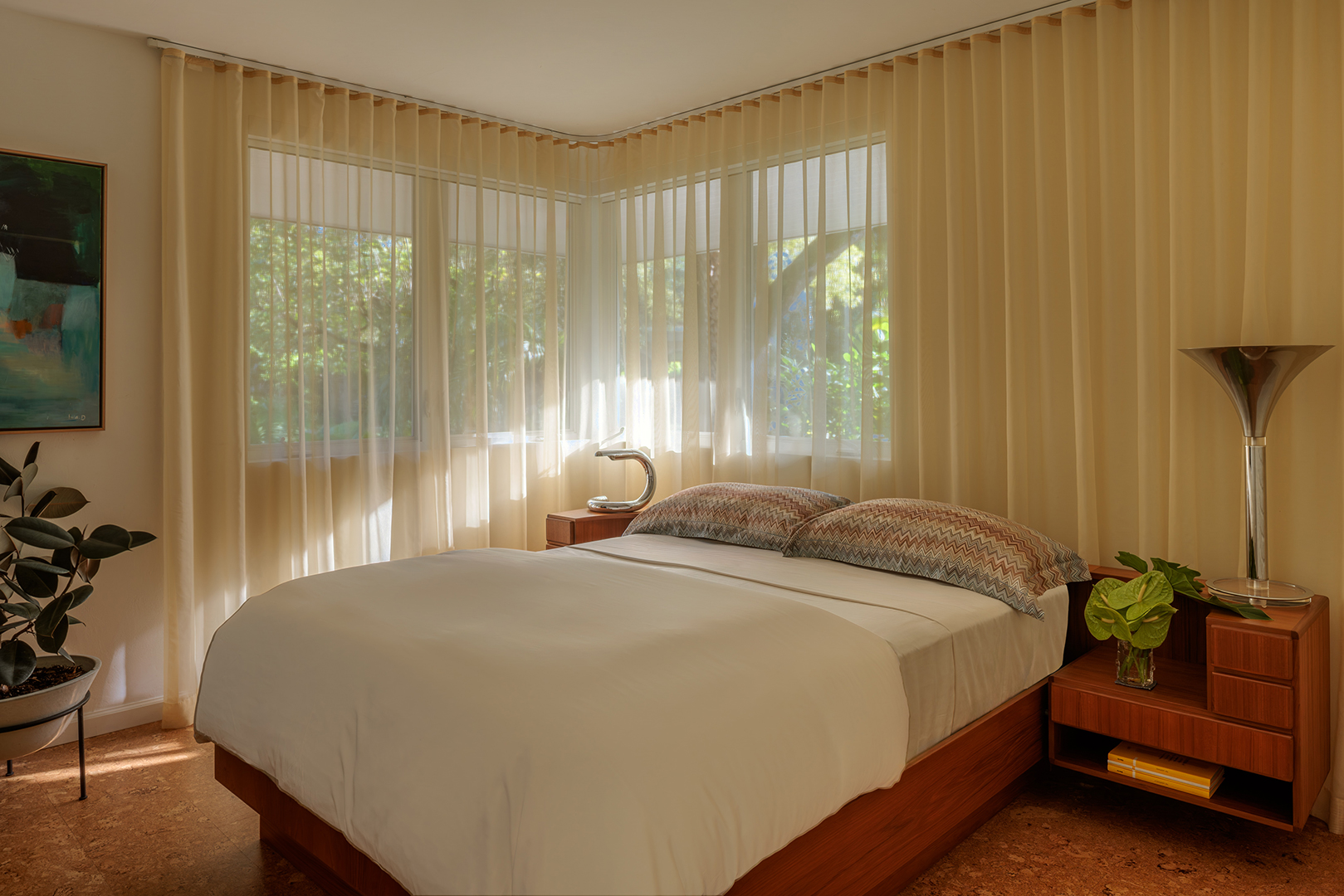 bedroom with sheer curtains