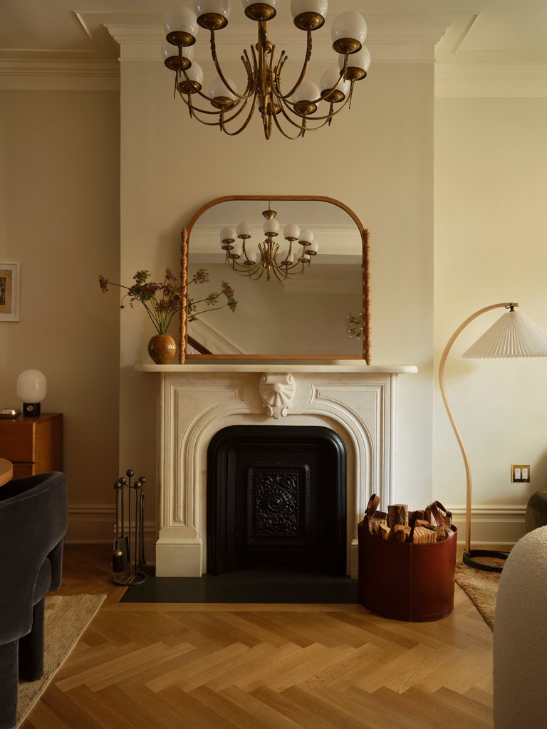 cream colored room with marble mantel