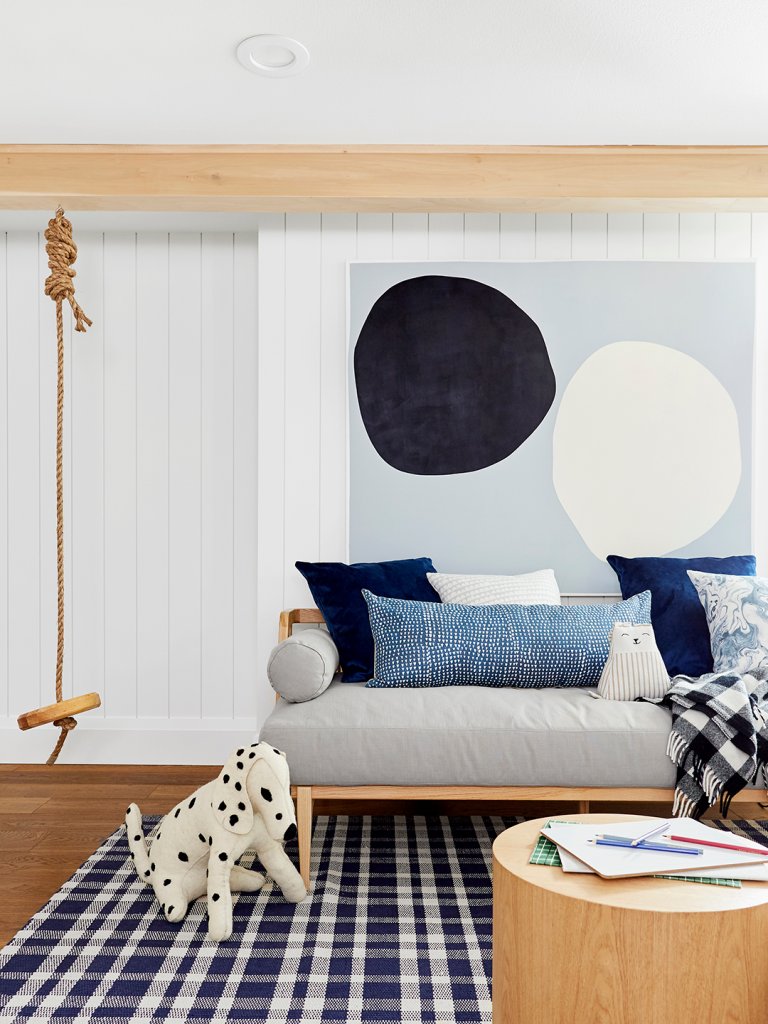 play room with swing beside the sofa