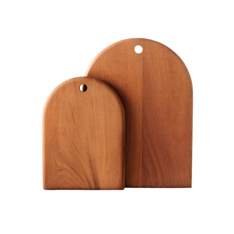  two arched wooden cutting boards