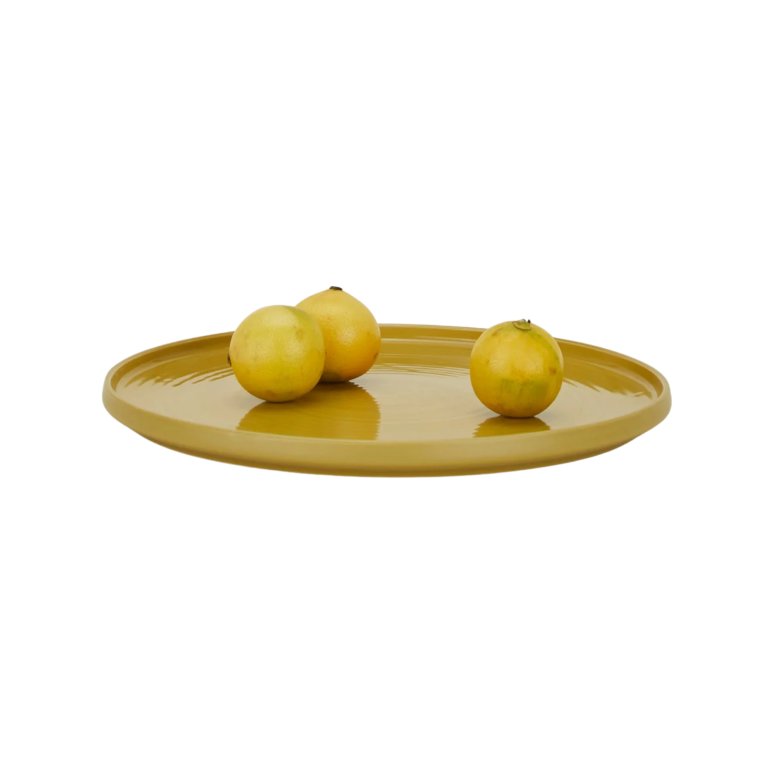 yellow plate with three citrus