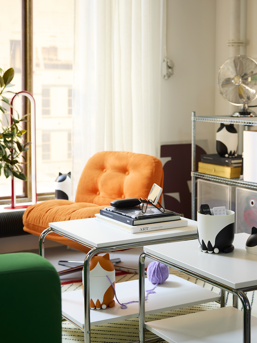 living room with 2 white coffee tables