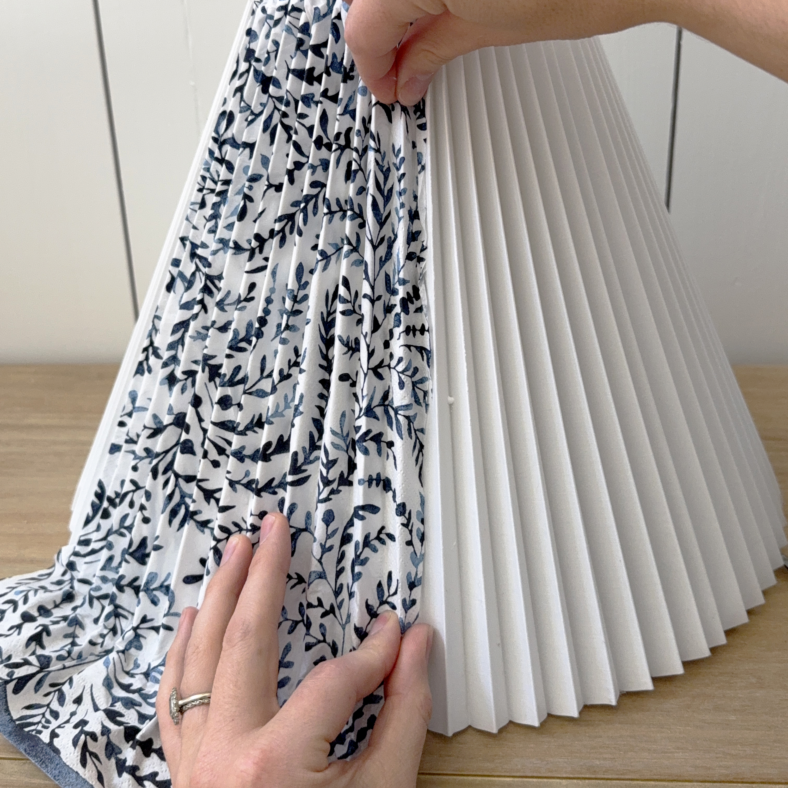 pressing fabric into lampshade pleats